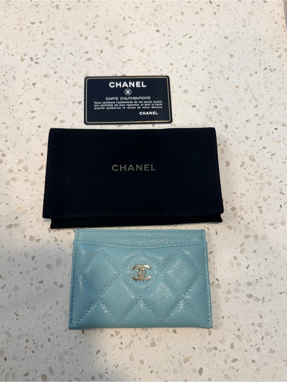 CHANEL Quilted Card Holder in Light Blue with Gold CC Hardware